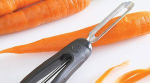 Carrots and a peeler, used to provide healthy snacks