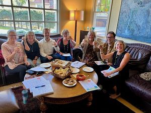 Marnie and Janica, HIP founders, holding their Strong Not Wrong Community Partner Award